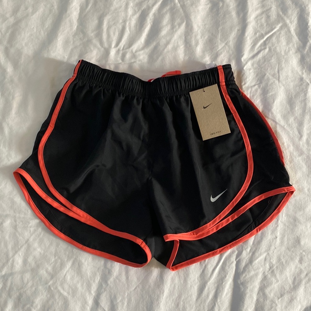 Small Nike athletic shorts, new with tags.